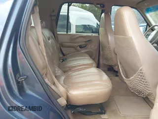 1998 Ford Expedition XLT with VIN 1FMRU17L1WLA99979, listed as a IAAI auction lot 41569667 with 215,937 mi miles. Bid and sale history available at carsss.com. Image 8.