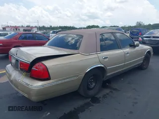 1999 Mercury Grand Marquis LS z VIN 2MEFM75W7XX665959, wystawiony jako IAAI lot #42187818 z przebiegiem 123 126 mil mil oraz . Historia ofert i sprzedaży dostępna na DreamBid. Obrazek 4.