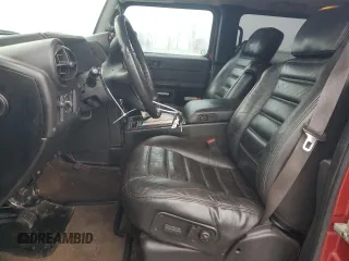2005 Hummer H2 SUV with VIN 5GRGN23U35H128685, listed as a Copart auction lot 43031545 with 132,053 mi miles and Salvage Title. Bid and sale history available at carsss.com. Image 7.