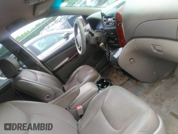 2005 Toyota Sienna XLE z VIN 5TDZA22C15S300142, wystawiony jako IAAI lot #42377092 z przebiegiem 255 272 mil mil oraz . Historia ofert i sprzedaży dostępna na DreamBid. Obrazek 5.