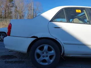 2001 Mazda Protege LX with VIN JM1BJ225710406286, listed as a IAAI auction lot 41887127 with Not Provided miles and . Bid and sale history available at DreamBid. Image 15.