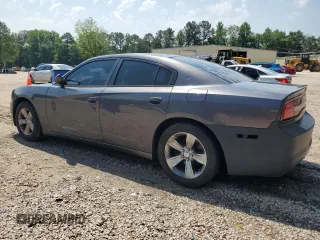2013 Dodge Charger SE z VIN 2C3CDXBG4DH664652, wystawiony jako Copart lot #57317865 z przebiegiem 160 497 mil mil oraz Tytuł czysty. Historia ofert i sprzedaży dostępna na DreamBid. Obrazek 2.