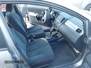 2011 Nissan Versa 1.8 S with VIN 3N1BC1AP9BL423170, listed as a IAAI auction lot 41821121 with 246,940 mi miles. Bid and sale history available at carsss.com. Image 5.