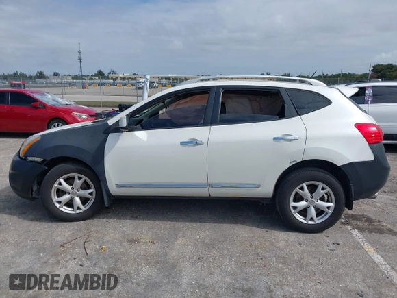 2011 Nissan Rogue SV z VIN JN8AS5MT8BW172782, wystawiony jako IAAI lot #42005682 z przebiegiem 178 755 mil mil oraz . Historia ofert i sprzedaży dostępna na DreamBid. Obrazek 14.