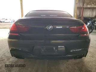 2014 BMW 6 Series 650i with VIN WBA6B2C52ED129040, listed as a Copart auction lot 83829924 with 116,674 mi miles and Salvage Title. Bid and sale history available at DreamBid. Image 6.