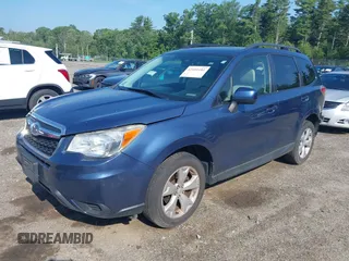 2014 Subaru Forester Premium z VIN JF2SJAEC9EH469385, wystawiony jako IAAI lot #42491181 z przebiegiem 149 321 mil mil oraz . Historia ofert i sprzedaży dostępna na DreamBid. Obrazek 19.