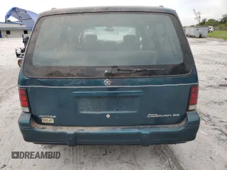 1995 Dodge Caravan Grand SE z VIN 1B4GH44R8SX633988, wystawiony jako Copart lot #65667454 z przebiegiem 121 183 mil mil oraz Tytuł czysty. Historia ofert i sprzedaży dostępna na DreamBid. Obrazek 6.