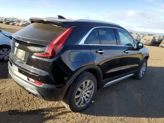 2020 Cadillac XT4 AWD Premium Luxury with VIN 1GYFZDR49LF032597, listed as a Copart auction lot 88595595 with 82,324 mi miles and Salvage title. Bid and sale history available at DreamBid. Image 3.