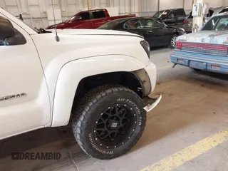 2007 Toyota Tacoma with VIN 5TELU42NX7Z435698, listed as a IAAI auction lot 42243332 with 207,618 mi miles and . Bid and sale history available at DreamBid. Image 6.