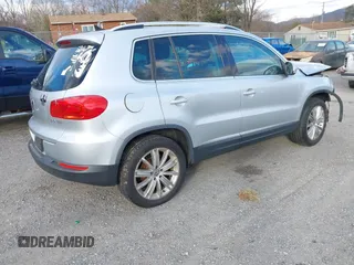 2012 Volkswagen Tiguan SE with VIN WVGAV7AX2CW543003, listed as a IAAI auction lot 41803970 with 187,639 mi miles and . Bid and sale history available at DreamBid. Image 4.