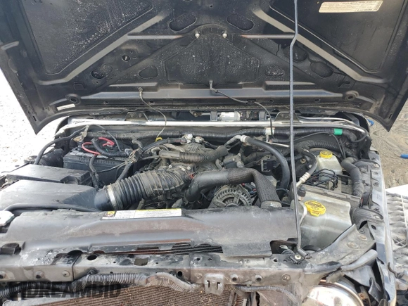 2008 Jeep Wrangler Unlimited Sahara with VIN 1J4GA59178L607960, listed as a Copart auction lot 57855995 with 122,913 mi miles and Salvage title. Bid and sale history available at DreamBid. Image 12.