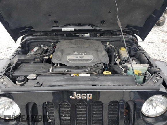 2015 Jeep Wrangler Unlimited Sahara with VIN 1C4BJWEGXFL606573, listed as a Copart auction lot 83983894 with 103,314 mi miles and Clean title. Bid and sale history available at DreamBid. Image 13.