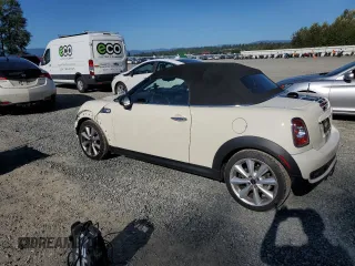 2015 MINI Roadster S z VIN WMWSY3C56FT595466, wystawiony jako Copart lot #69655944 z przebiegiem 53 971 mil mil oraz Szkody całkowita. Historia ofert i sprzedaży dostępna na DreamBid. Obrazek 2.