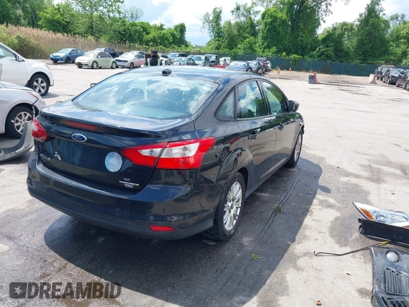2012 Ford Focus SE with VIN 1FAHP3F24CL107411, listed as a IAAI auction lot 42177334 with 89,242 mi miles and . Bid and sale history available at DreamBid. Image 4.