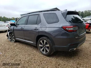2023 Honda Pilot Elite with VIN 5FNYG1H86PB015516, listed as a Copart auction lot 69514093 with 11,500 mi miles. Bid and sale history available at carsss.com. Image 2.
