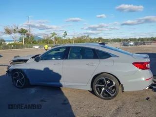 2022 Honda Accord Sport z VIN 1HGCV1F35NA117128, wystawiony jako IAAI lot #40957497 z przebiegiem 29 636 mil mil oraz . Historia ofert i sprzedaży dostępna na DreamBid. Obrazek 15.