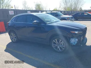 2024 Mazda CX-30 2.5 S Carbon Edition with VIN 3MVDMBCMXRM604020, listed as a IAAI auction lot 42042155 with 24,545 mi miles. Bid and sale history available at carsss.com. Image 1.