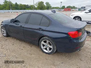 2013 BMW 3 Series 328i xDrive with VIN WBA3B3C50DJ698249, listed as a IAAI auction lot 42303923 with 130,527 mi miles and . Bid and sale history available at DreamBid. Image 3.