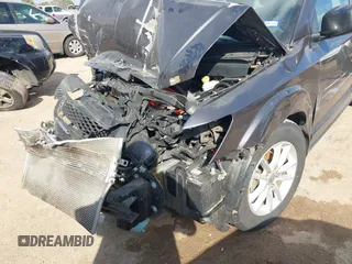 2015 Dodge Journey SXT with VIN 3C4PDCBG0FT733952, listed as a IAAI auction lot 41521687 with 80,974 mi miles and . Bid and sale history available at DreamBid. Image 14.