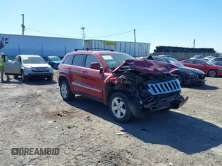 2012 Jeep Grand Cherokee Laredo with VIN 1C4RJFAG4CC297151, listed as a IAAI auction lot 41903618 with 222,357 mi miles. Bid and sale history available at carsss.com. Image 1.