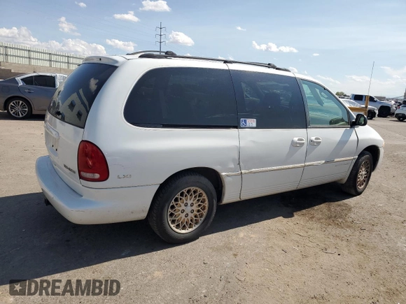 1998 Chrysler Town & Country LXi with VIN 1C4GP64L2WB637437, listed as a Copart auction lot 70504424 with 82,972 mi miles and Salvage Title. Bid and sale history available at carsss.com. Image 3.