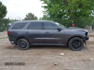 2015 Dodge Durango SXT with VIN 1C4RDJAG0FC947060, listed as a IAAI auction lot 42505938 with 124,705 mi miles and . Bid and sale history available at DreamBid. Image 13.