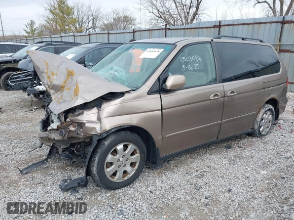 2004 Honda Odyssey EX z VIN 5FNRL18634B004127, wystawiony jako IAAI lot #41854878 z przebiegiem 242 601 mil mil oraz . Historia ofert i sprzedaży dostępna na DreamBid. Obrazek 17.