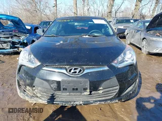 2016 Hyundai Veloster z VIN KMHTC6AD1GU262391, wystawiony jako IAAI lot #41649087 z przebiegiem 96 104 mil mil oraz . Historia ofert i sprzedaży dostępna na DreamBid. Obrazek 12.