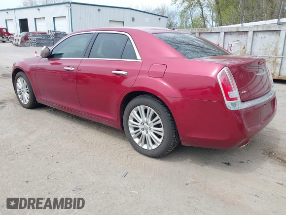 2012 Chrysler 300 C with VIN 2C3CCAKTXCH220185, listed as a IAAI auction lot 42110327 with 57,682 mi miles and . Bid and sale history available at DreamBid. Image 3.