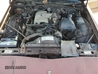 1990 Mercury Grand Marquis z VIN 2MECM79F8LX618527, wystawiony jako Copart lot #46685505 z przebiegiem 65 316 mil mil oraz Tytuł czysty. Historia ofert i sprzedaży dostępna na DreamBid. Obrazek 11.