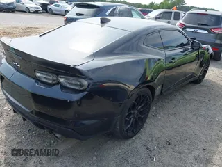 2019 Chevrolet Camaro 1LT z VIN 1G1FA1RX1K0127249, wystawiony jako IAAI lot #42240323 z przebiegiem 69 945 mil mil oraz . Historia ofert i sprzedaży dostępna na DreamBid. Obrazek 4.