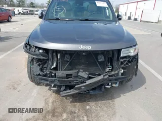 2014 Jeep Grand Cherokee Overland with VIN 1C4RJFCT6EC187098, listed as a IAAI auction lot 42077453 with 172,220 mi miles and . Bid and sale history available at DreamBid. Image 6.