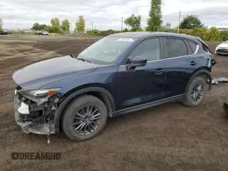 2019 Mazda CX-5 Touring with VIN JM3KFBCM9K0561888, listed as a Copart auction lot 72496194 with 93,996 mi miles and Salvage Title. Bid and sale history available at carsss.com. Image 1.