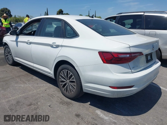 2021 Volkswagen Jetta S z VIN 3VWC57BU4MM037088, wystawiony jako IAAI lot #42087111 z przebiegiem 82 728 mil mil oraz . Historia ofert i sprzedaży dostępna na DreamBid. Obrazek 3.