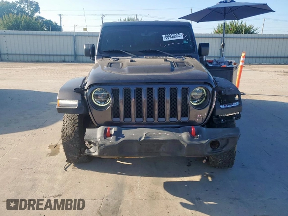 2018 Jeep Wrangler Unlimited Rubicon z VIN 1C4HJXFN3JW236121, wystawiony jako Copart lot #60930565 z przebiegiem 128 727 mil mil oraz Szkoda całkowita • Salvage title. Historia ofert i sprzedaży dostępna na DreamBid. Obrazek 5.
