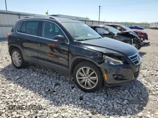 2011 Volkswagen Tiguan SEL w/Premium Navi with VIN WVGAV7AX6BW511380, listed as a Copart auction lot 54360535 with 113,808 mi miles and Salvage title. Bid and sale history available at DreamBid. Image 4.