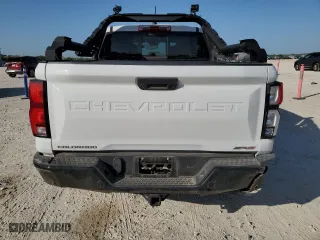2024 Chevrolet Colorado 4WD ZR2 with VIN 1GCPTFEKXR1111908, listed as a Copart auction lot 52836865 with 25,106 mi miles and Salvage Title. Bid and sale history available at carsss.com. Image 6.