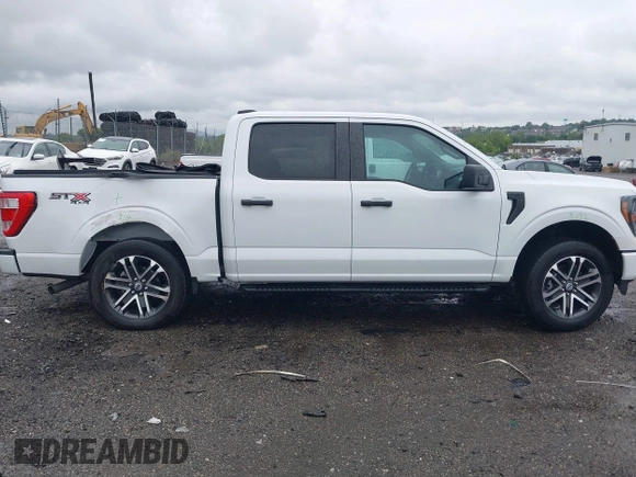 2023 Ford F-150 XL with VIN 1FTEW1EP5PFB87582, listed as a IAAI auction lot 42254015 with 10,476 mi miles and . Bid and sale history available at DreamBid. Image 13.