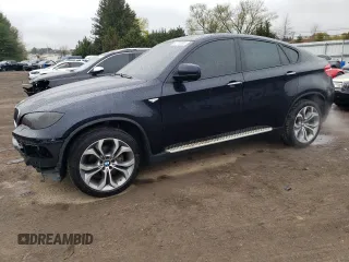 2013 BMW X6 xDrive35i z VIN 5UXFG2C57DL785676, wystawiony jako Copart lot #52720095 z przebiegiem 118 516 mil mil oraz Szkoda całkowita • Salvage title. Historia ofert i sprzedaży dostępna na DreamBid. Obrazek 1.
