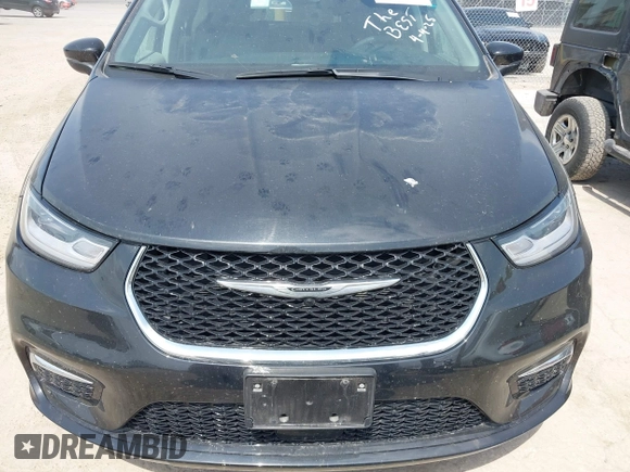 2023 Chrysler Pacifica Hybrid Touring L with VIN 2C4RC1L75PR592251, listed as a IAAI auction lot 42037873 with 44,428 mi miles and . Bid and sale history available at DreamBid. Image 12.