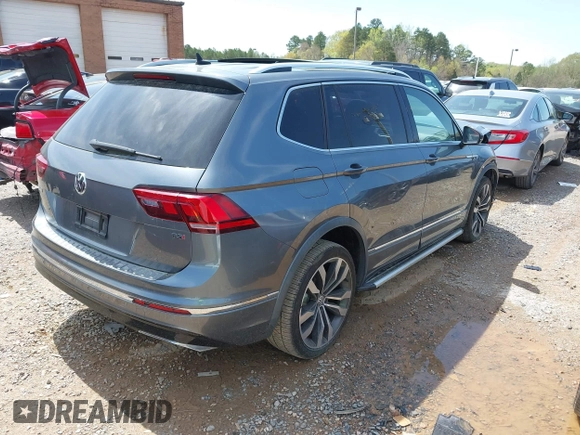 2018 Volkswagen Tiguan SEL Premium with VIN 3VV5B7AX4JM201579, listed as a IAAI auction lot 41932201 with 118,728 mi miles and . Bid and sale history available at DreamBid. Image 4.