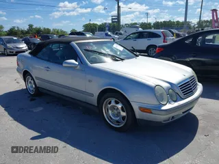 1999 Mercedes-Benz CLK with VIN WDBLK65G0XT027433, listed as a IAAI auction lot 41841339 with Not Provided miles. Bid and sale history available at carsss.com. Image 1.