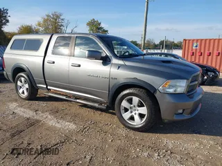 2011 Ram 1500 ST with VIN 1D7RV1GTXBS556473, listed as a IAAI auction lot 40711248 with 210,581 mi miles. Bid and sale history available at carsss.com. Image 1.