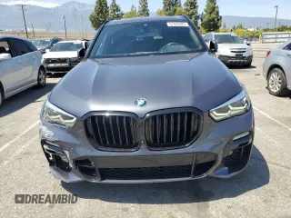 2021 BMW X5 xDrive40i with VIN 5UXCR6C06M9H65380, listed as a Copart auction lot 57445405 with 33,916 mi miles and Salvage title. Bid and sale history available at DreamBid. Image 5.