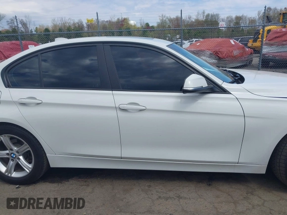 2015 BMW 3 Series 328i xDrive with VIN WBA3B5C51FF960765, listed as a IAAI auction lot 42074658 with 106,598 mi miles and . Bid and sale history available at DreamBid. Image 14.