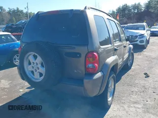 2002 Jeep Liberty Limited with VIN 1J8GL58K82W149287, listed as a IAAI auction lot 41982603 with 154,449 mi miles and . Bid and sale history available at carsss.com. Image 4.