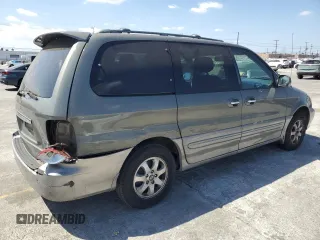 2005 Kia Sedona LX with VIN KNDUP132956661322, listed as a Copart auction lot 71431874 with 101,875 mi miles and Salvage Title. Bid and sale history available at carsss.com. Image 3.