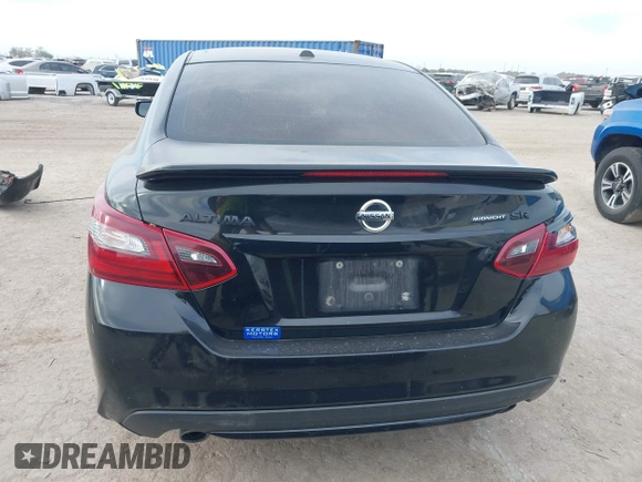 2018 Nissan Altima 2.5 SR with VIN 1N4AL3AP3JC298848, listed as a IAAI auction lot 40966335 with 121,163 mi miles. Bid and sale history available at carsss.com. Image 17.