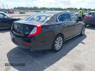 2014 Lincoln MKS with VIN 1LNHL9EK0EG608300, listed as a IAAI auction lot 41900902 with 144,253 mi miles. Bid and sale history available at carsss.com. Image 4.