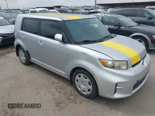 2012 Scion xB with VIN JTLZE4FE0CJ012235, listed as a IAAI auction lot 41894195 with 196,970 mi miles. Bid and sale history available at carsss.com. Image 1.